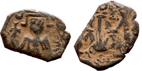 al-Malik ibn Marwan (687-705), Constans II style folis Obverse: Imperial figure holding globus Reverse: m and inscription