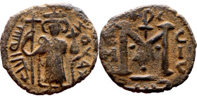 al-Malik ibn Marwan (687-705), Constans II style folis Obverse: Imperial figure holding globus Reverse: m and inscription