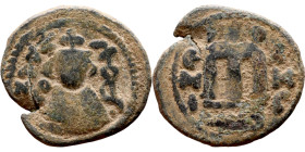 al-Malik ibn Marwan (687-705), Constans II style folis Obverse: Imperial figure holding globus Reverse: m and inscription