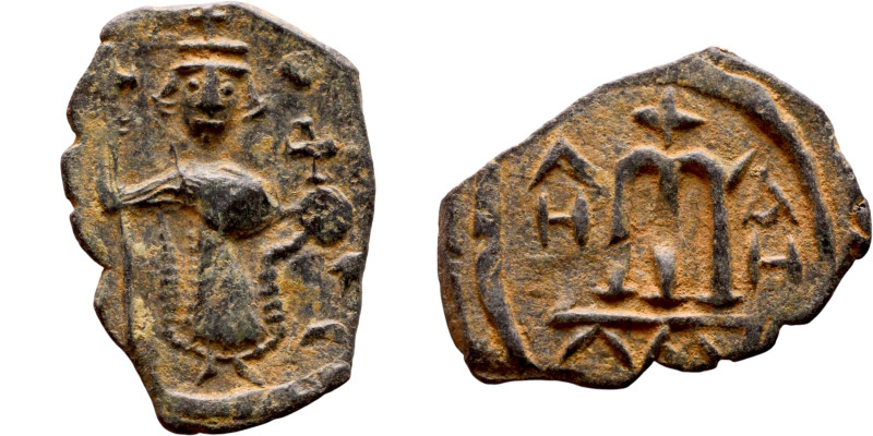 al-Malik ibn Marwan (687-705), Constans II style folis Obverse: Imperial figure ...