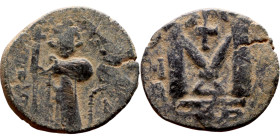 al-Malik ibn Marwan (687-705), Constans II style folis Obverse: Imperial figure holding globus Reverse: m and inscription