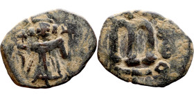 al-Malik ibn Marwan (687-705), Constans II style folis Obverse: Imperial figure holding globus Reverse: m and inscription