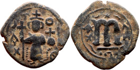 al-Malik ibn Marwan (687-705), Constans II style folis Obverse: Imperial figure holding globus Reverse: m and inscription