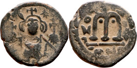 al-Malik ibn Marwan (687-705), Constans II style folis Obverse: Imperial figure holding globus Reverse: m and inscription