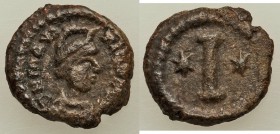 Maurice Tiberius (AD 582-602). AE decanummium (15mm, 2.40 gm, 11h). VF. Ravenna, AD 586-602. D N mAVR-Tib PP AVG, helmeted, draped and cuirassed bust ...