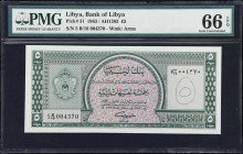 LIBYA. Bank of Libya. 5 Pounds, 1963. P-31. PMG Gem Uncirculated 66 EPQ.
Surpassed in the PMG population report by just a single finer example, this ...