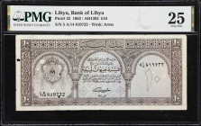 LIBYA. Bank of Libya. 10 Pounds, 1963. P-32. PMG Very Fine 25.
The highest denomination of this series and a scarce note in all grades. While this ex...