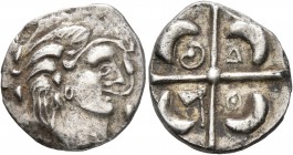 CELTIC, Southern Gaul. Longostaletes. 2nd century BC. Drachm (Silver, 17 mm, 3.10 g), 'à la croix' type. Celticized male head to right with volutes be...