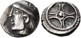GAUL. Massalia. Circa 450-410 BC. Obol (Silver, 9 mm, 0.70 g). Male head with long hair to left, wearing helmet adorned with wheel of four spokes on t...