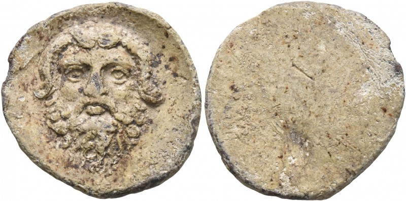 UNCERTAIN. Tessera (Lead, 19 mm, 4.38 g), circa 1st-2nd centuries. Bearded and h...