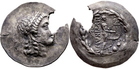 Aeolis, Myrina (160-143 BC) Silver coin. Obv: Head of Apollo in a laurel wreath facing right Rev: ΜΥΡΙΝΑΙΩΝ In a laurel wreath, Apollo standing to the...