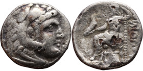 Alexander iii and successors. Silver Drachm Obverse: Head of Herakles to right, wearing lion skin headdress Rev: Zeus seated left on low throne, holdi...
