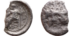 Hellenistic period coin (4-1 century BC)Silver. Obverse: Unredable Rev: Zeus seated left on low throne, holding long scepter in his left hand