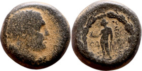 Uncertain ruler (Seleukid Kings: III- I BC) bronze coin. Obv: Bust of zeus. Standing Apollo