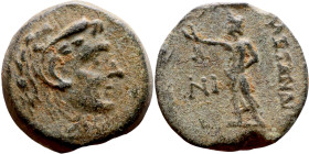 Alexander I Ballas (Seleukid king: 150-145) Bronze. Obv: Bust of king  Rev: ΑΠAMEΩN, Zeus standing left holding corinthian helmet in right hand and sc...
