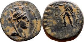 Hellenistic period coin (4-1 century BC) bronze coin. Obv: Bust of Tyche. Rev: Standing figure