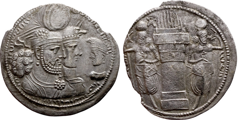 Varahran (Bahram) II. AR Drachm Obv: Jugate busts of Varahran, wearing winged cr...