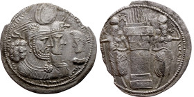 Varahran (Bahram) II. AR Drachm Obv:  Jugate busts of Varahran, wearing winged crown with korymbos, and his queen, wearing kolah with boar’s head, rig...