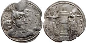 Varahran (Bahram) II. AR Drachm Obv:  Jugate busts of Varahran, wearing winged crown with korymbos, and his queen, wearing kolah with boar’s head, rig...