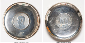 People's Republic Republic "Junk" Dollar Coin Mounted silver Ash-Tray, 90.8mm. 68.8gm. Silver dish or ash-tray with coin copy mounted at base. Sterlin...