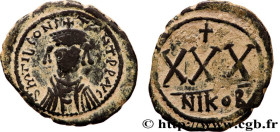TIBERIUS II CONSTANTINE
Type : Trois quarts de follis 
Date : 578-579 
Mint name / Town : Nicomédie 
Metal : copper 
Diameter : 32,5  mm
Orientation d...