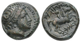 Kings Of Macedon. Philip II. Ae, 6.05 g 17.07 mm. 359-336 BC. Uncertain mint in Macedon.
Obv: Male head right, wearing tainia.
Rev: ΦΙΛΙΠΠΟΥ. Youth on...