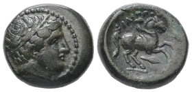 Kings of Macedon. Philip II, 359-336 BC. Ae, 6.17 g 17.16 mm. Uncertain mint in Macedonia. 
Obv: Diademed head of Apollo to right. 
Rev: ΦΙΛΙΠΠΟΥ, You...