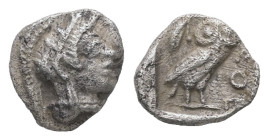 Attica, Athens. AR Hemiobol, 0.30 g 7.74 mm. Circa 454-404 BC.
Obv: Helmeted head of Athena right.
Rev: AΘΕ, Owl standing right, head facing; olive sp...