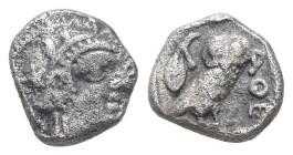 Attica, Athens. AR Obol, 0.65 g. - 8.53 mm. Circa 454-404 BC.
Obv.: Helmeted head of Athena right.
Rev.: AΘE, Owl standing right, head facing; olive s...