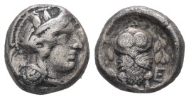 Attica, Athens. AR Hemidrachm, 2.10 g. - 10.90 mm. Circa 454-404 BC.
Obv.: Helmeted head of Athena right, with frontal eye.
Rev.: A - Θ – Ε. Owl stand...