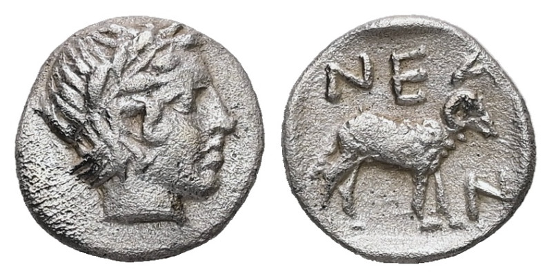 Troas, Neandria. AR Hemiobol, 0.53 g 9.30 mm. 4th century BC.
Obv: Laureate head...