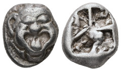 Mysia, Parion. AR Drachm, 3.92 g 13.56 mm. 5th century BC.
Obv: Facing gorgoneion with protruding tongue.
Rev: Disorganized linear pattern within incu...