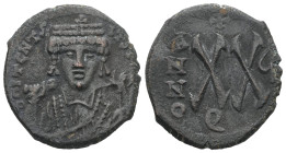 Maurice Tiberius, AD 582-602. AE, Half Follis. 7.60 g. 22.94 mm. Theoupolis (Antioch). 
Obv: DΠITCNTS(?). Frontal bust of Maurice wearing loros and cr...