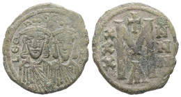 Leo III 'the Isaurian' and Constantine V, AD 717-741. AE, Follis. 4.27 g. 22.28 mm. Constantinople.
Obv: LEOҺ- SC-OҺSƮ. The busts of Leo, with short b...