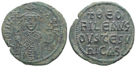 Theophilus, AD 829-842. AE, Follis. 7.81 g. 27.48 mm. Constantinople.
Obv: ΘEOFIL-bASIL. Crowned, three-quarter length figure of Theophilus facing, pe...