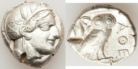 ATTICA. Athens. Ca. 440-404 BC. AR tetradrachm (25mm, 17.17 gm, 9h). VF, test cut. Mid-mass coinage issue. Head of Athena right, wearing crested Attic...