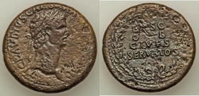 Claudius I (AD 41-54). AE sestertius (35mm, 24.16 gm, 7h). VF, pitting. Rome, ca. AD 41-50. TI•CLAVDIVS•CAESAR•AVG•P•M•TR•P•IMP, laureate head of Clau...