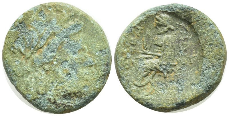 IONIA. Smyrna. Ae (19mm, 7.3 g) (Circa 75-50 BC). Obv: Laureate head of Apollo r...