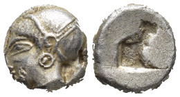 Ionia. Phokaia circa 521-478 BC. Diobol AR (1.7 Gr. 8mm.) 
Archaic female head left, wearing earring and helmet or close fitting cap 
Rev. Incuse squa...