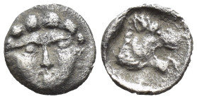 Pamphylia, Aspendos, c. 420-360 BC. AR Hemiobol (8mm, 0.4 g). Facing gorgoneion. R/ Lion’s head r.