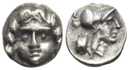 Pisidia. Selge circa 350-300 BC. Obol AR (8mm, 0,65 g) Gorgoneion / Head of Athena to right, wearing crested Attic helmet; behind, astragalos.