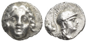 Pisidia. Selge circa 350-300 BC. Obol AR (9mm, 0,9 g) Gorgoneion / Head of Athena to right, wearing crested Attic helmet; behind, astragalos.