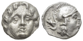 Pisidia. Selge circa 350-300 BC. Obol AR (9mm, 0,9 g) Gorgoneion / Head of Athena to right, wearing crested Attic helmet; behind, astragalos.