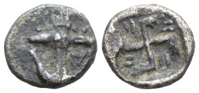 THRACE. Apollonia Pontika. Hemiobol (Circa 540/35-530 BC). (0.40 Gr. 7mm.)
Inverted anchor; A to left, pellets below.
 Rev. Winged clockwise swastika,...