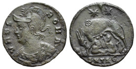 Commemorative AD 335-337. Antioch Follis (1.7 Gr. 17mm.) 
Rev. Helmeted head of Roma left, in imperial mantle, and ornamental necklace 
Rev. She-wolf ...