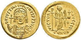 Justinian I, 527-565. Solidus (18mm, 4.4 g), Constantinopolis, 545-565. D N IVSTINIANVS P P AVI Helmeted and cuirassed bust of Justinian I facing, hol...
