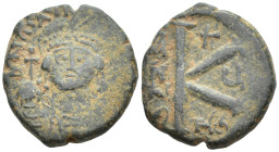 MAURICE TIBERIUS (582-602). Half Follis. Thessalonica. (6.1 Gr. 19mm.)
 Crowned and cuirassed bust facing, holding globus cruciger and shield
Rev: Lar...