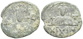 Constantine VI and Irene, AD 780-797. AE, Follis.. Constantinople. (2.8 Gr. 18mm.)
Crowned bust of Irene wearing loros, holding cross on globe and cro...