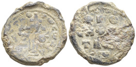 Byzantine Lead Seal (19mm, 6.6 g). Patriarchal cross on steps with floral ornaments springing from base. Rev: Legends in three lines.
