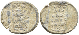 Byzantine Lead Seal (20mm, 5.5 g). Patriarchal cross on steps with floral ornaments springing from base. Rev: Legends in five lines.